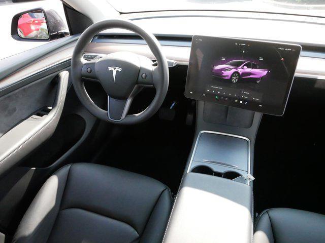 used 2024 Tesla Model Y car, priced at $34,975