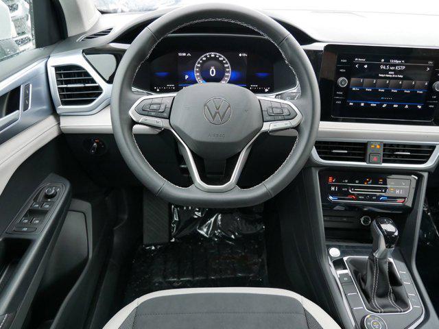 new 2025 Volkswagen Taos car, priced at $30,016