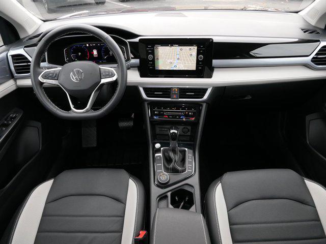 used 2025 Volkswagen Taos car, priced at $31,975