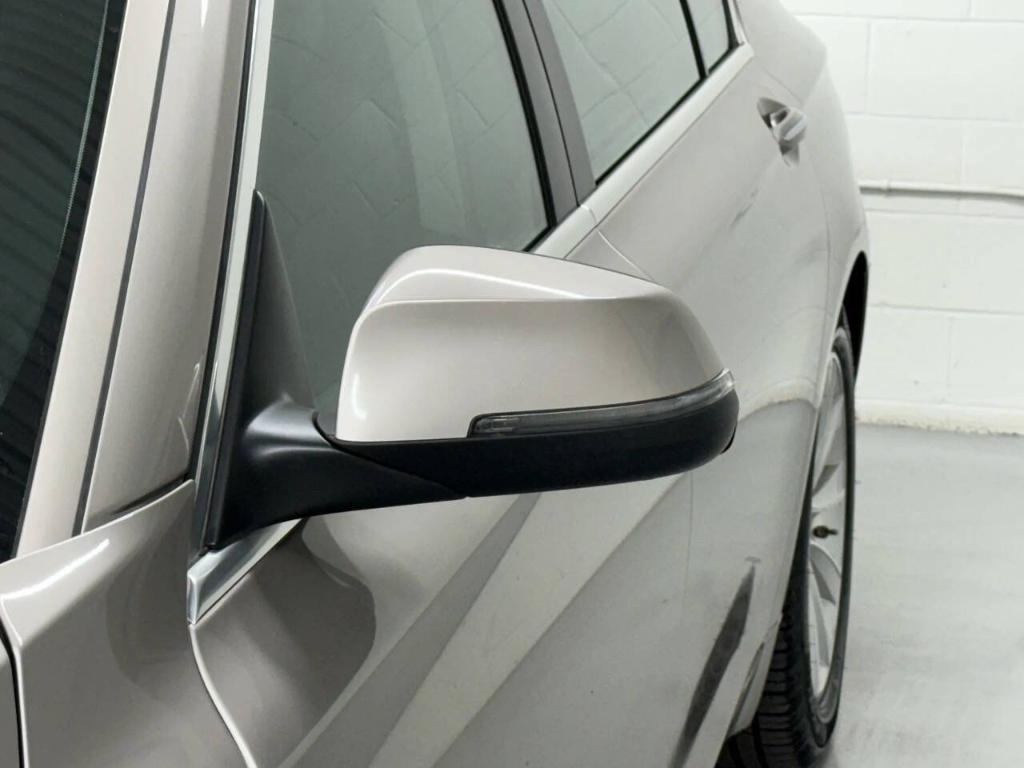 used 2015 BMW 740 car, priced at $14,533