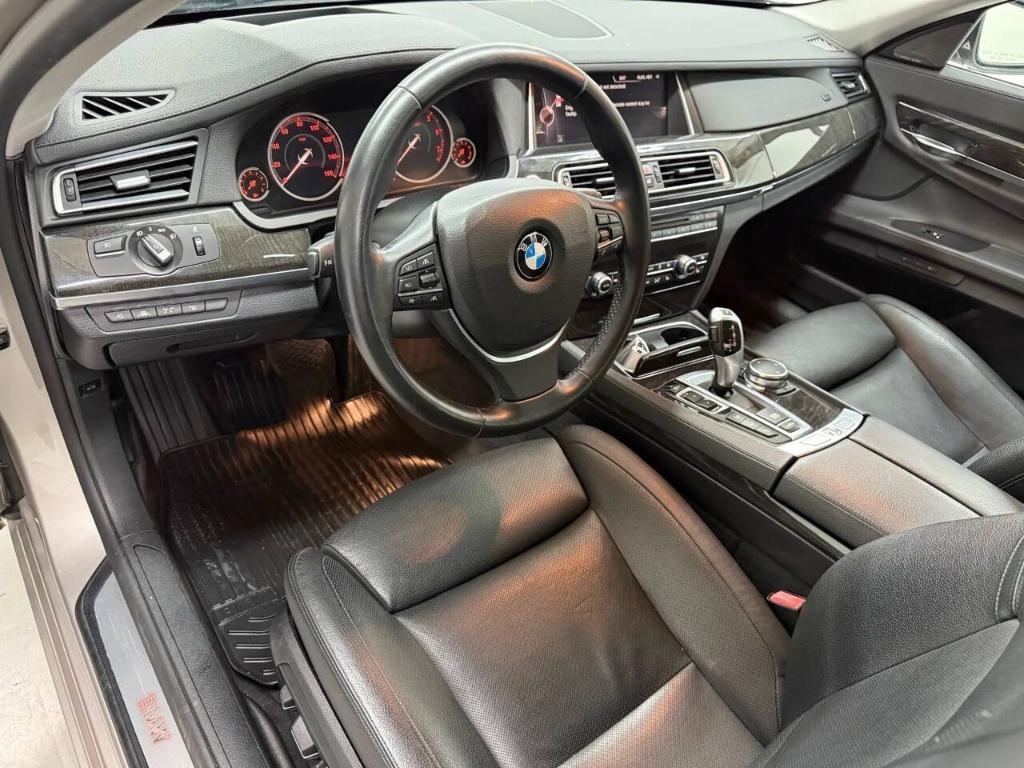 used 2015 BMW 740 car, priced at $14,533