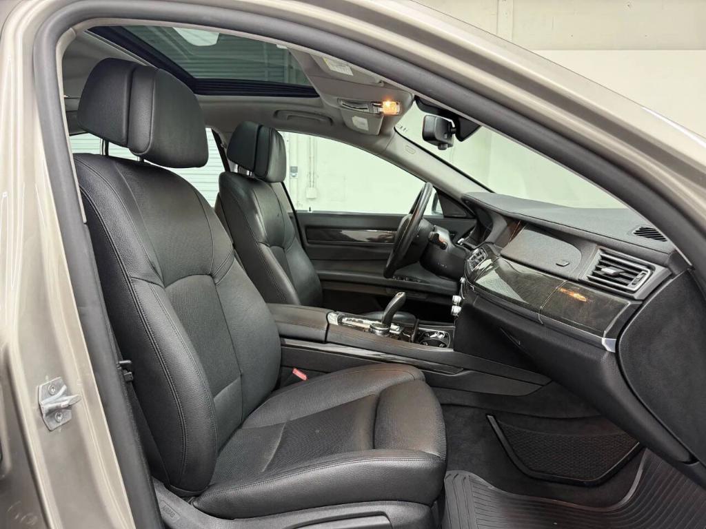 used 2015 BMW 740 car, priced at $14,533