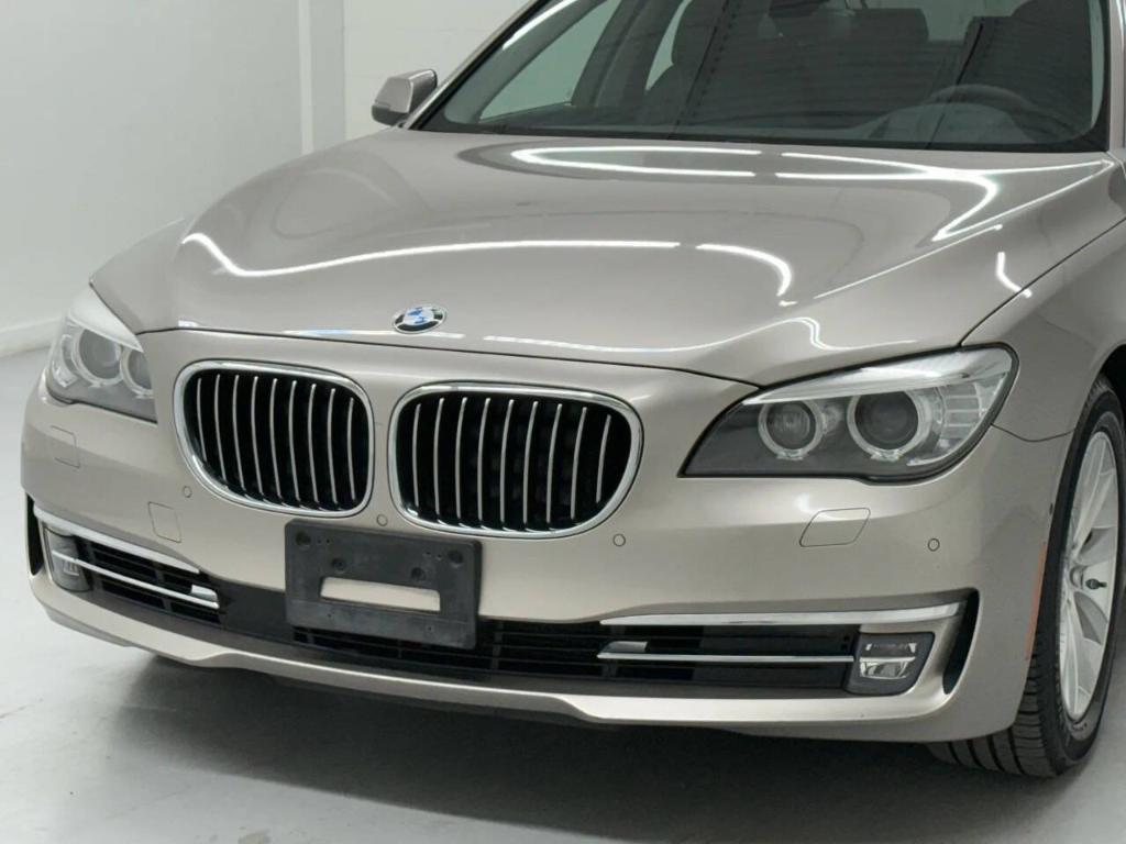 used 2015 BMW 740 car, priced at $14,533