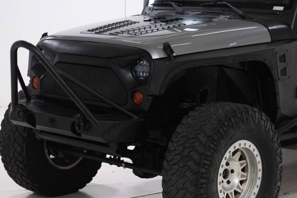 used 2011 Jeep Wrangler Unlimited car, priced at $24,695