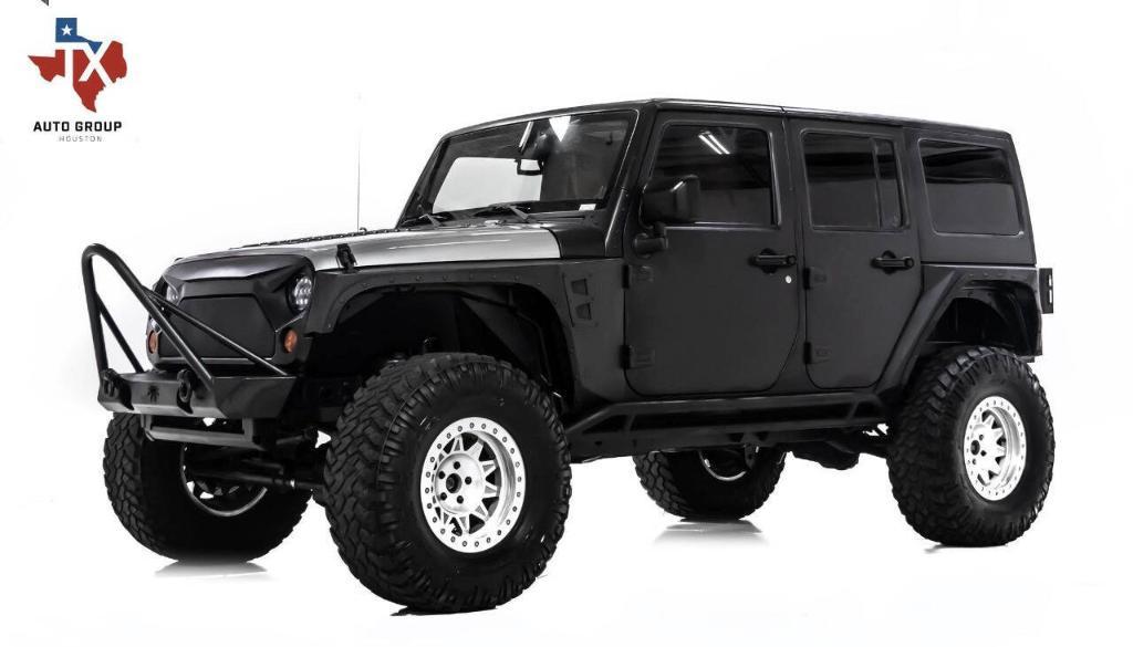 used 2011 Jeep Wrangler Unlimited car, priced at $24,695