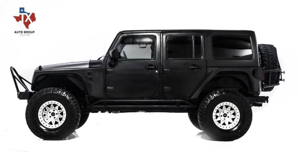 used 2011 Jeep Wrangler Unlimited car, priced at $24,395