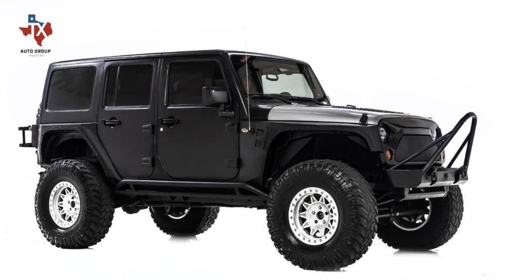 used 2011 Jeep Wrangler Unlimited car, priced at $24,695