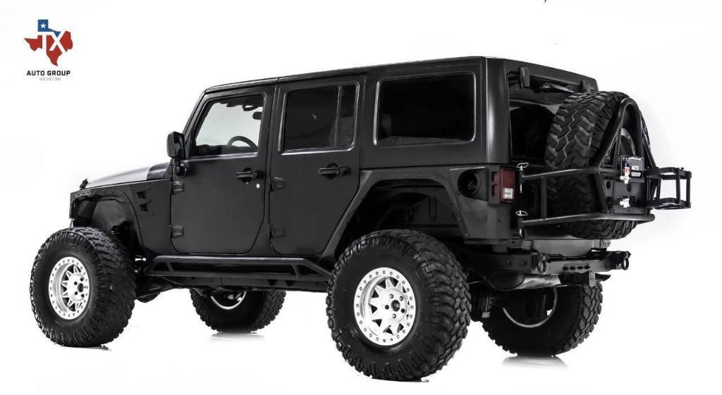 used 2011 Jeep Wrangler Unlimited car, priced at $24,695