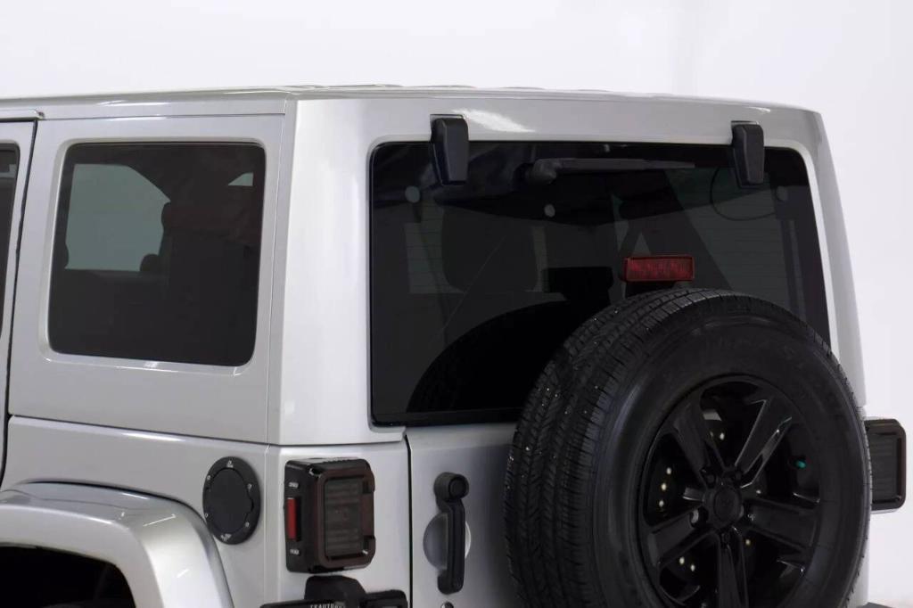 used 2012 Jeep Wrangler Unlimited car, priced at $16,099