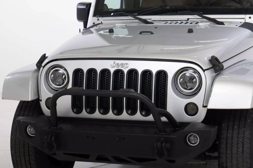 used 2012 Jeep Wrangler Unlimited car, priced at $16,099