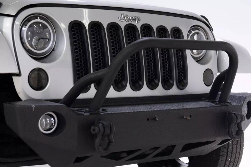 used 2012 Jeep Wrangler Unlimited car, priced at $16,099