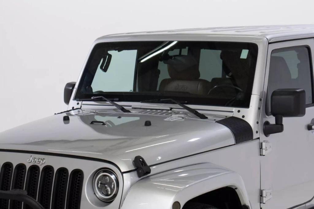 used 2012 Jeep Wrangler Unlimited car, priced at $16,099