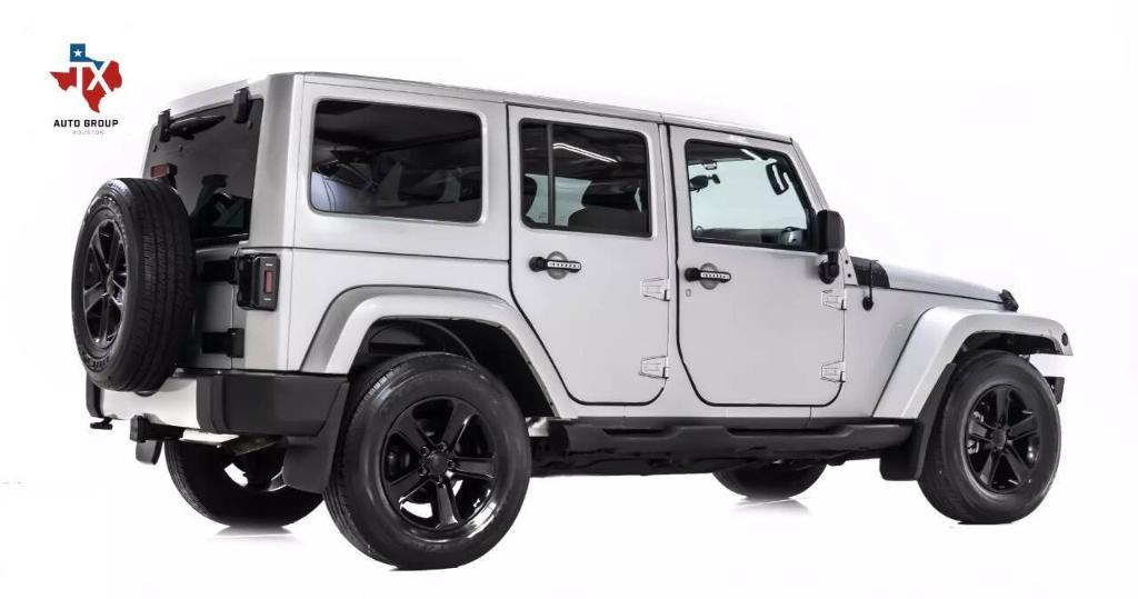 used 2012 Jeep Wrangler Unlimited car, priced at $16,099