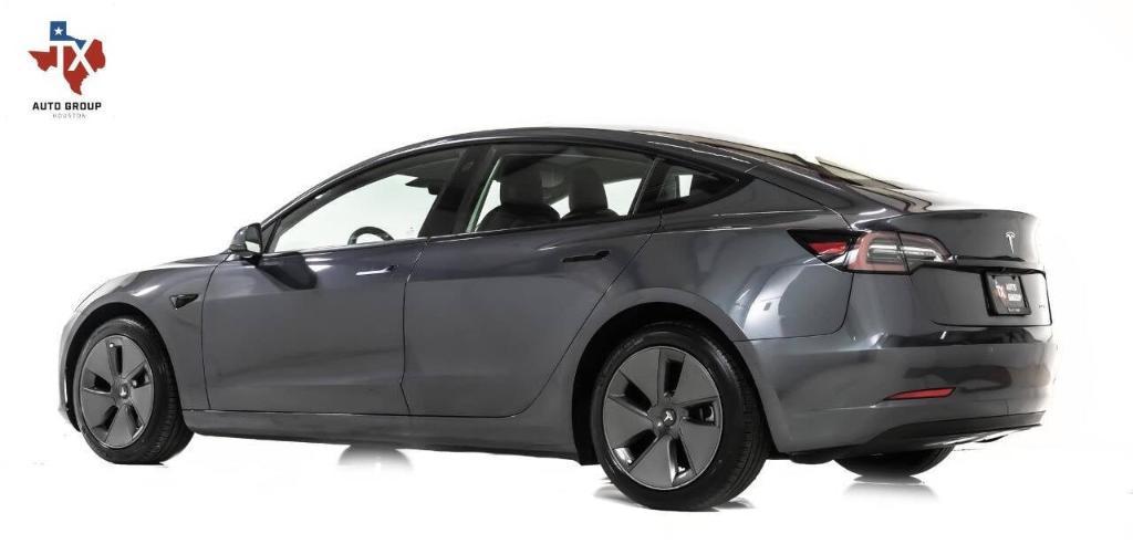 used 2022 Tesla Model 3 car, priced at $28,995