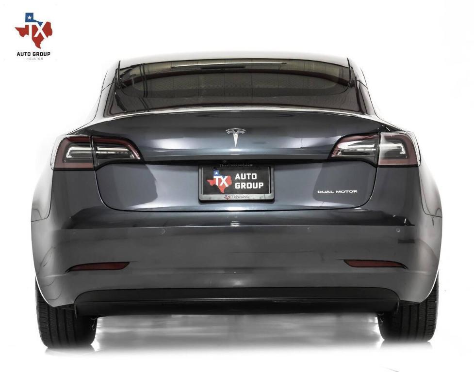 used 2022 Tesla Model 3 car, priced at $28,995