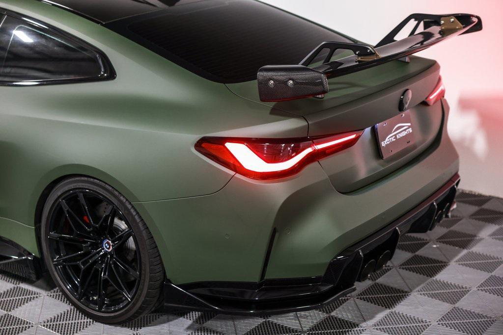 used 2023 BMW M4 car, priced at $78,990