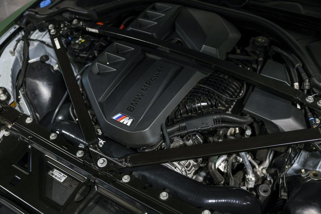 used 2023 BMW M4 car, priced at $78,990