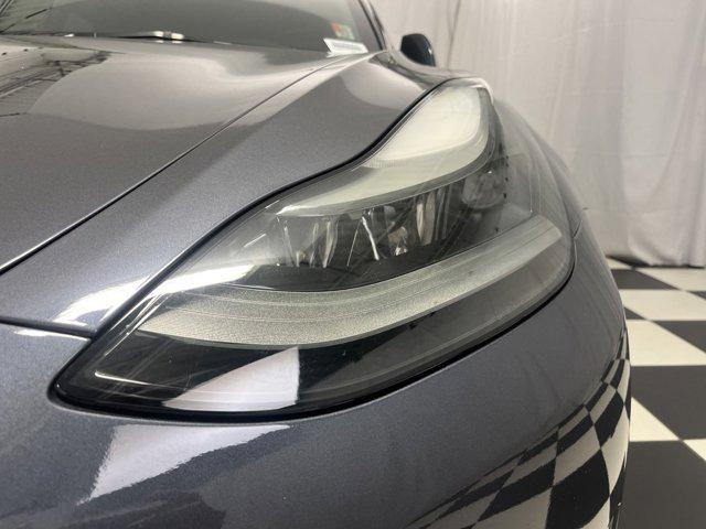 used 2023 Tesla Model 3 car, priced at $35,525