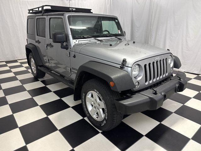 used 2017 Jeep Wrangler Unlimited car, priced at $17,149