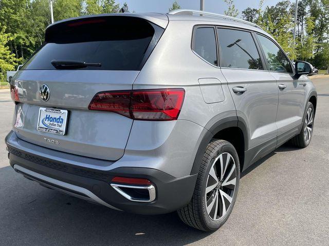used 2024 Volkswagen Taos car, priced at $24,118