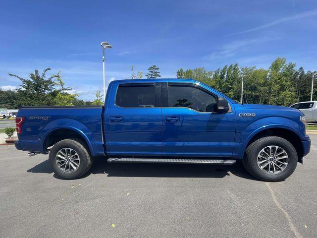 used 2018 Ford F-150 car, priced at $23,553