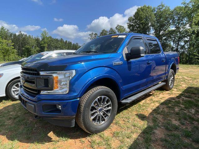 used 2018 Ford F-150 car, priced at $24,648