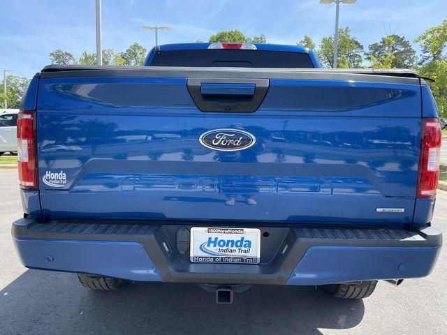 used 2018 Ford F-150 car, priced at $23,553