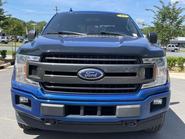 used 2018 Ford F-150 car, priced at $23,553