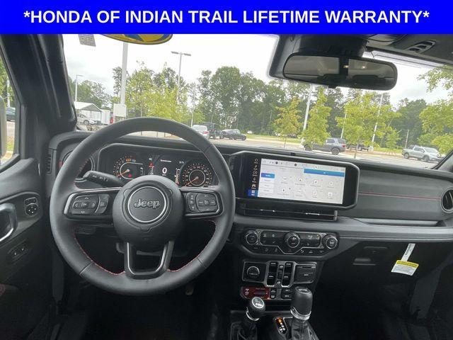 used 2024 Jeep Wrangler car, priced at $47,397