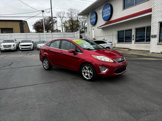 used 2011 Ford Fiesta car, priced at $6,000