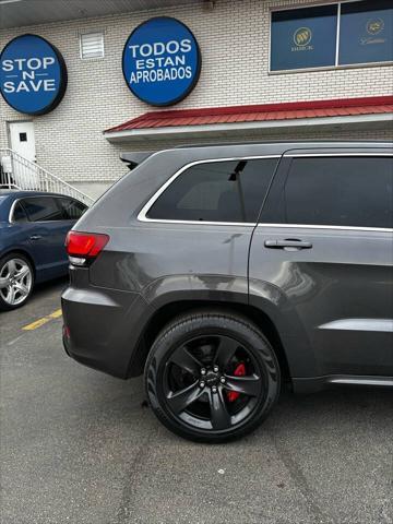 used 2014 Jeep Grand Cherokee car, priced at $28,000