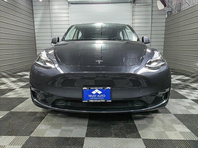used 2025 Tesla Model Y car, priced at $37,495