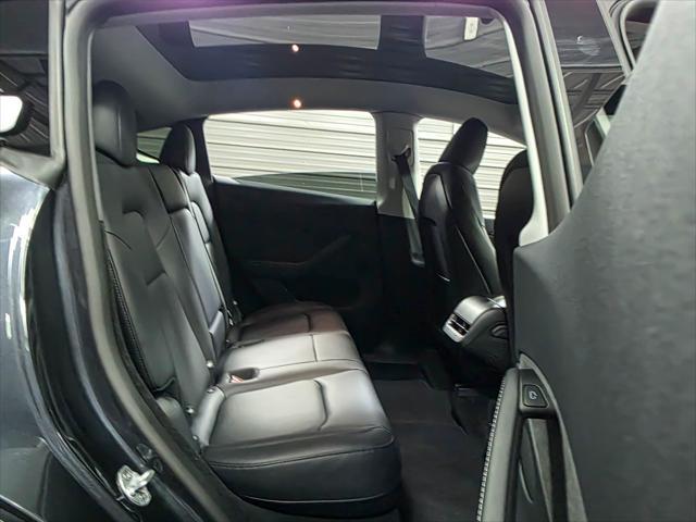 used 2025 Tesla Model Y car, priced at $37,495