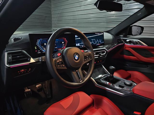 used 2024 BMW M4 car, priced at $75,895