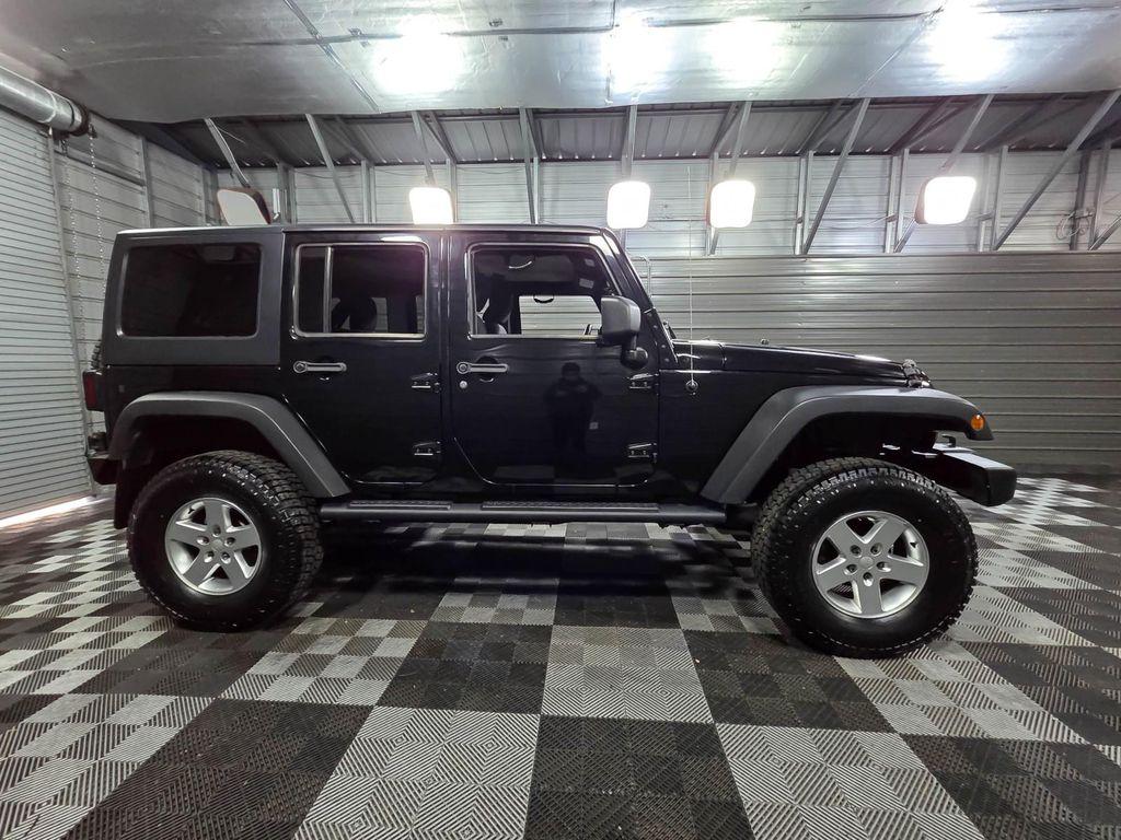 used 2013 Jeep Wrangler Unlimited car, priced at $14,395