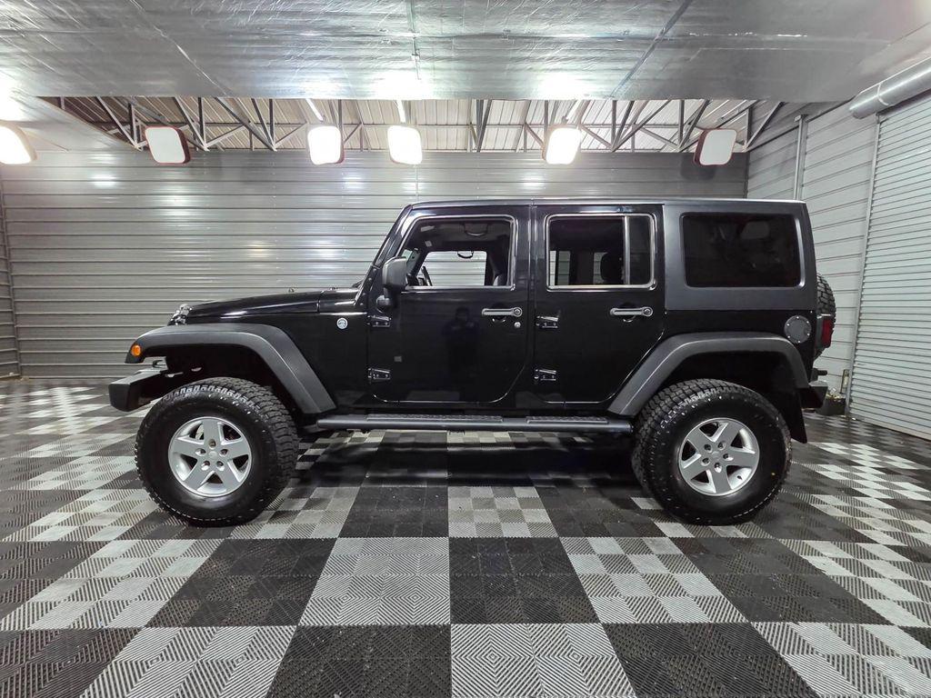 used 2013 Jeep Wrangler Unlimited car, priced at $14,395