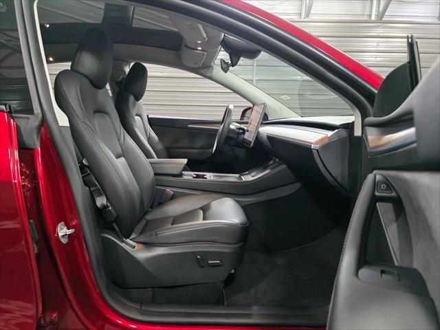 used 2024 Tesla Model Y car, priced at $35,695