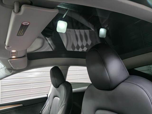 used 2024 Tesla Model Y car, priced at $35,695
