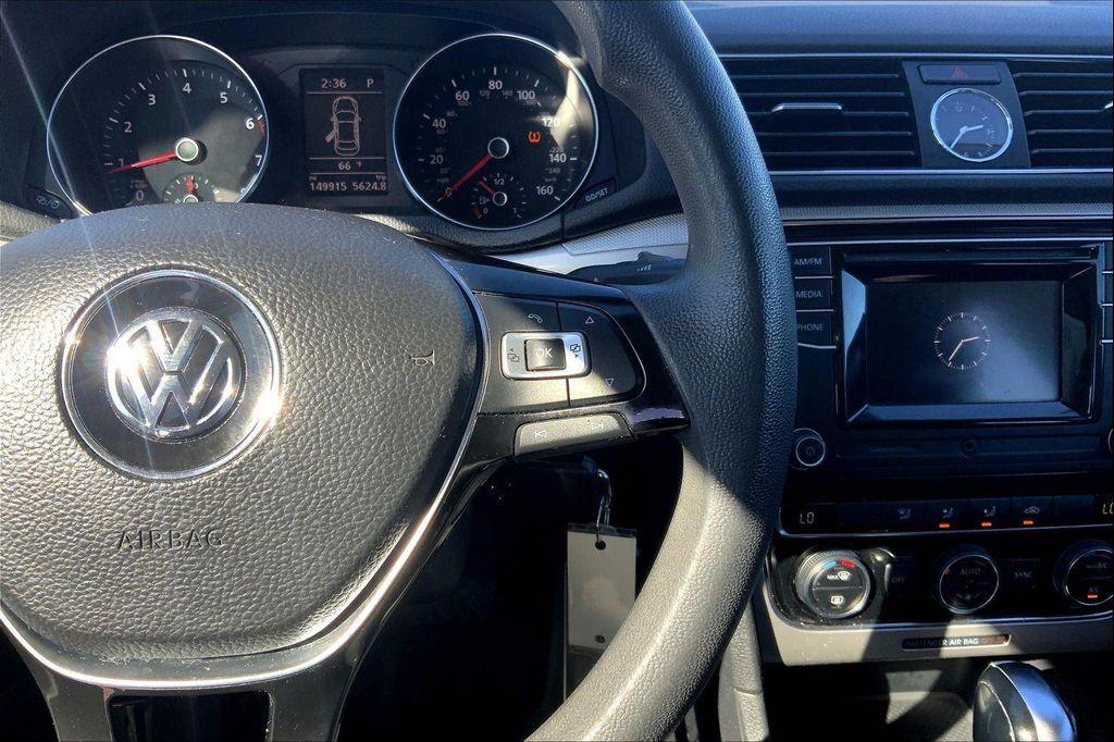used 2016 Volkswagen Passat car, priced at $6,495