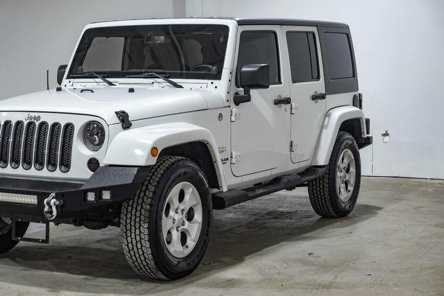 used 2013 Jeep Wrangler Unlimited car, priced at $14,750