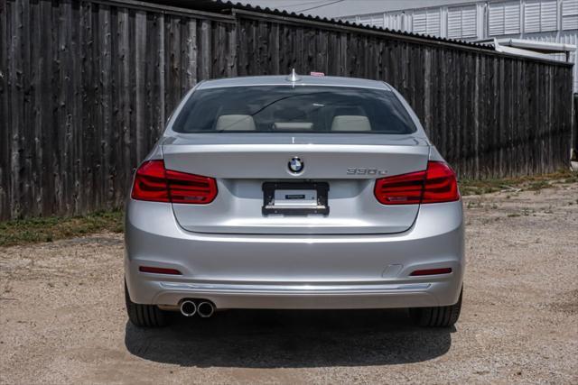 used 2018 BMW 330e car, priced at $20,690