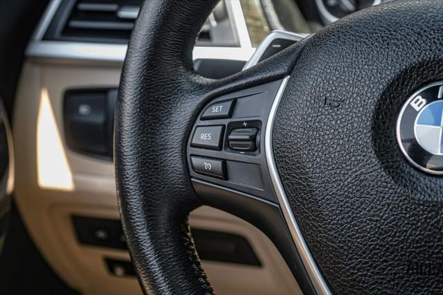 used 2018 BMW 330e car, priced at $20,690
