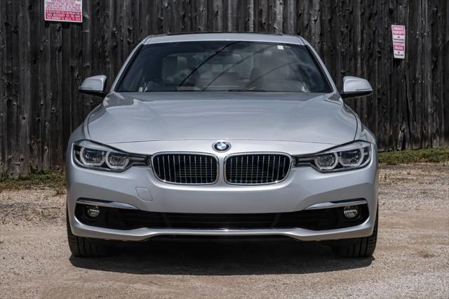 used 2018 BMW 330e car, priced at $20,690