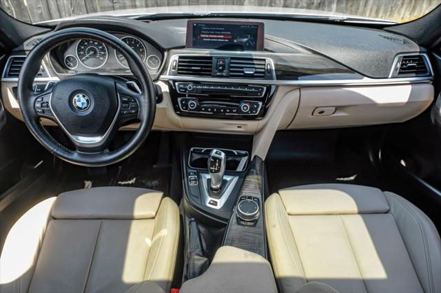 used 2018 BMW 330e car, priced at $20,690