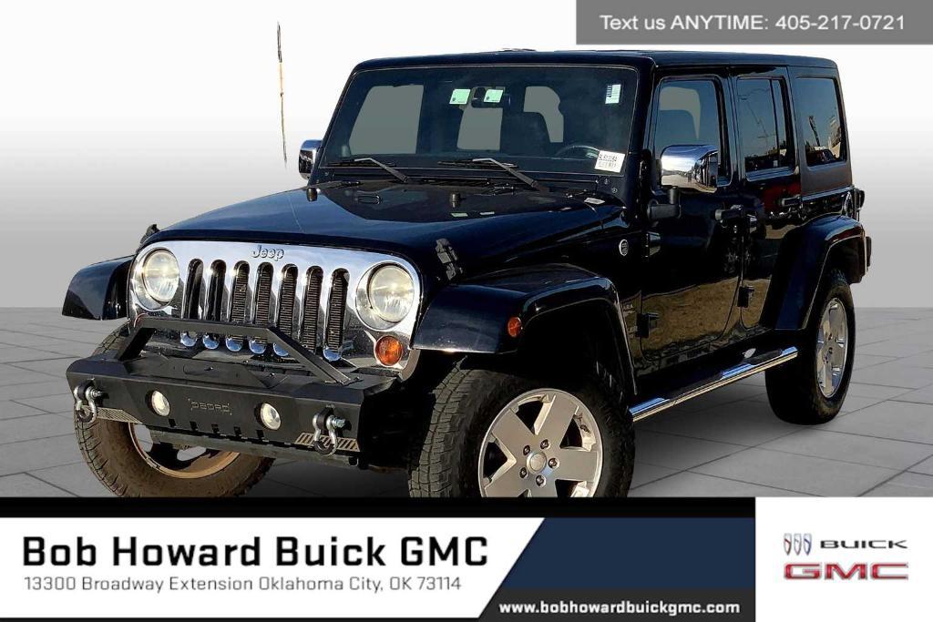 used 2011 Jeep Wrangler Unlimited car, priced at $16,577