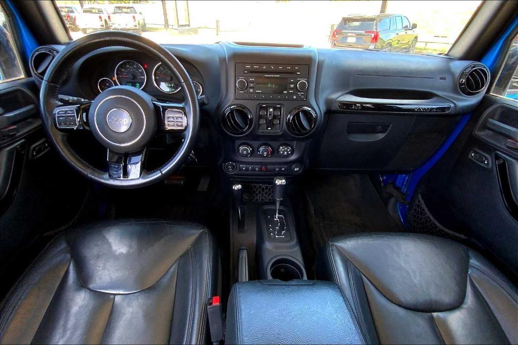 used 2015 Jeep Wrangler Unlimited car, priced at $21,233