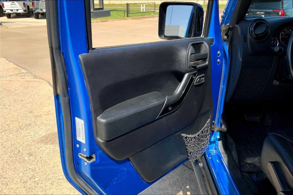 used 2015 Jeep Wrangler Unlimited car, priced at $21,233