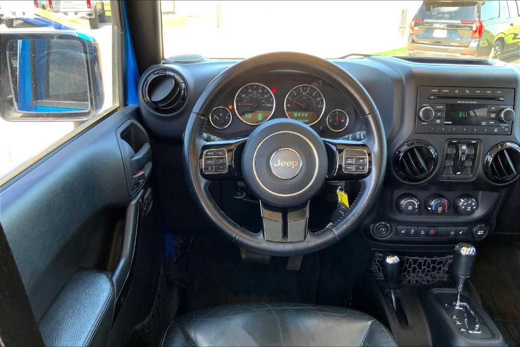 used 2015 Jeep Wrangler Unlimited car, priced at $21,233