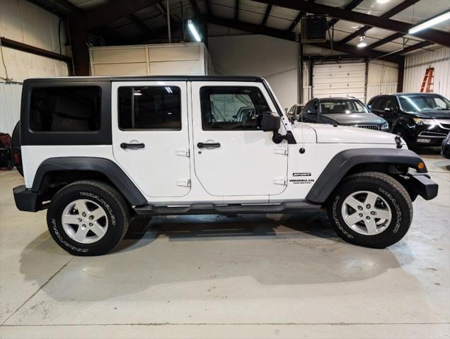 used 2012 Jeep Wrangler Unlimited car, priced at $16,950