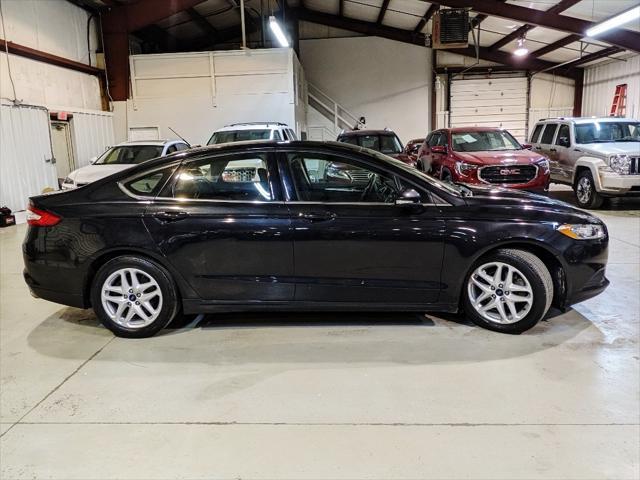 used 2014 Ford Fusion car, priced at $7,950